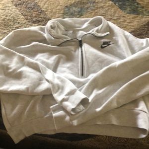 A Nike half zip sweater. A little short and long sleeve. Sure warm.